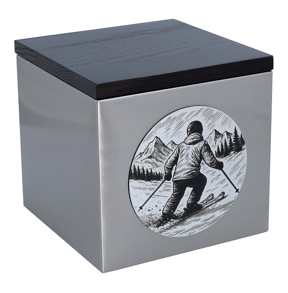 Nowoczesna urna na prochy z motywem narciarskim – stalowa urna z grawerem narciarza i krajobrazu górskiego, idealna dla pasjonatów nart i natury